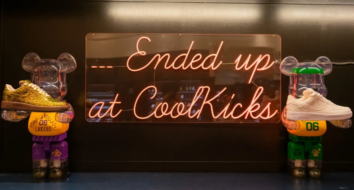 Cool Kicks store display with its neon sign and sneakers